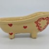 Porte savon baignoire beige motifs coeur